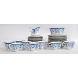 A vintage Royal Albert blue and white pattered tea service to include cups, saucers, plates etc.