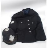 A vintage / retro Policemans Jacket and Helmet,