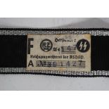 A WWII reproduction Waffen SS "Prinz Eugen" cuff title with label to back with SS symbol and RZ M