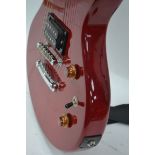 A Rockwood by Hohner Gibson style solid body electric guitar in red, with case.