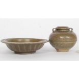 A Celadon dish, having a pair of fish raised in relief, made in the northern province Honan,