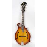 MUSICAL INSTRUMENTS: An original 20th century cased mandolin, with  F holes in original case.