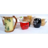 A good collection of vintage 20th century ceramic whisky jugs to include Haig, VAT69, Bells,