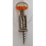 A vintage, likely Caithness but unnamed, paperweight inset corkscrew.