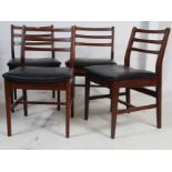 A set of 4 1970's Danish solid teak wood dining chairs.