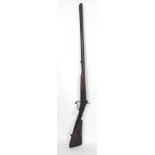 A Victorian 12 bore side by side double barrel shotgun having hammer percussion pin fire.