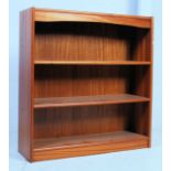 A good 1970's solid teak Danish open window bookcase  having inset plinth with central open window