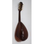 An early 20th century pear shaped bowl back mandolin ( Musical Instrument )  having paper label to