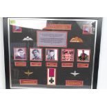 A framed and glazed and mounted montage depicting the recipients of the Victoria Cross from the