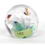 A Langham glass paperweight with white l