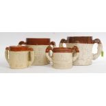 A collection of 4  large stoneware twin