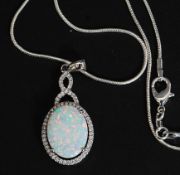 A ladies contemporary silver cz stone and large opalite necklace pendant and chain. 6.
