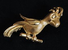 A vintage 9ct gold brooch in the shape of a parrot marked 9ct. Weight 2.