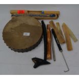 A collection of musical instruments to include an Okarina, Swanee Whistle, Schotts Descant Recorder,