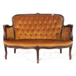 A 20th century Italian rococo two seat salon sofa settee raised on reeded supports with show wood