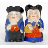 A pair of Royal Worcester male and female miniature toby jugs,