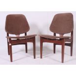 A pair of 1950's retro Danish influence bedroom nursing chairs with unusual design.