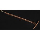 A 9ct gold albert chain / watch chain and bar. Stamped 9ct / 375 to bar and links. weight 14.