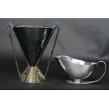 An Art Deco 1938 registered design creamer in silver plate. Bearing Rd 831101 to side.