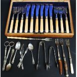 A collection of assorted flatware to include a silver collared cased fish knife & fork set,