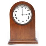 An  edWARDIAN mahogany dome mantle clock, having string inlay border,