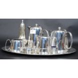 A good heavy silver plated tea service to consist of tea pot, coffee pot, creamer, sugar bowl,