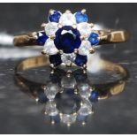 A 9ct gold, diamond and sapphire flower head ring.