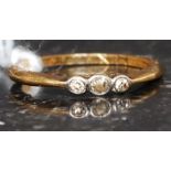 An early 20th century 18ct gold and diamond ring inset 3 diamonds approx 5pnts. Size M.