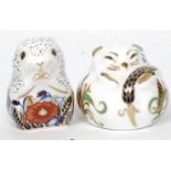 A Crown Derby ceramic figurine - Door mouse together with Poppy Mouse each with gold stoppers.