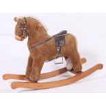 A plush rocking horse by Mamas and Papas, saddle height from floor 58cm.