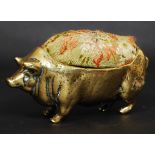 A good  19th century Victorian large brass pin cushion in the form of a pig. 87.2g.