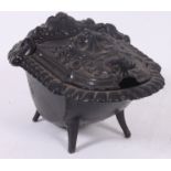 A 19th century French cast iron coal hod scuttle purdonium.