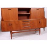 A good 1970's retro G-Plan teak wood sideboard - dresser raised on tapered legs with drawers and