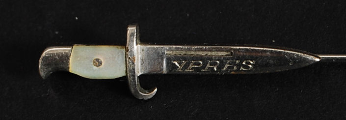 A white metal and silver stick pin - hat pin in the form of a bayonet inscribed Ypres. - Image 2 of 2