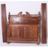 A 19th century carved French louis 16th style walnut double bed.