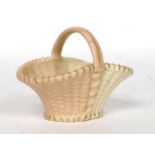 A small Royal Worcester Ivory Blush  basket of scalloped form with handle.