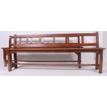 A 19th century pair of provincial pine refectory pig benches ( bench)  having  planked top with
