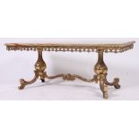 A 1950's green marble and gilt metal rococo vintage coffee table.