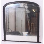 A large Victorian aesthetic movement dome top overmantel mirror.