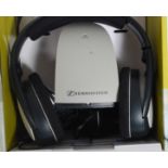 A pair of new in box Sennheiser Wireless Sound Experience headphones - Moel RS110