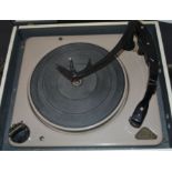 A vintage two tone Murphy portable four speed record player,