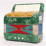 A vintage Chinese made ' Hero ' small squeeze box / accordion.