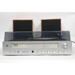 A retro PYE stereo, having record deck,