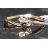 An 18ct gold ladies diamond ring.