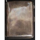 A silver hallmarked hip shaped cigarette case . Birmingham hallmarks for W J Myatt & Co Ltd 1916.