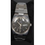 A gentlemans 1970's Omega Automatic Geneve wristwatch having grey face with baton numerals and