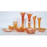 A collection of mid 20th century and later Carnival glass to include dishes, vases etc.