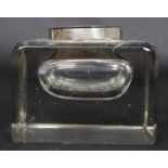 A large Edwardian glass brick and silver hallmarked inkwell.