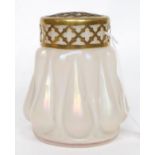 A Loetz style 20th century iridescent pear shaped vase having  a brass lattice work frog and
