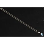 A silver kerb linked necklace with blue stone pendant in silver clasp. Total weight 6g.